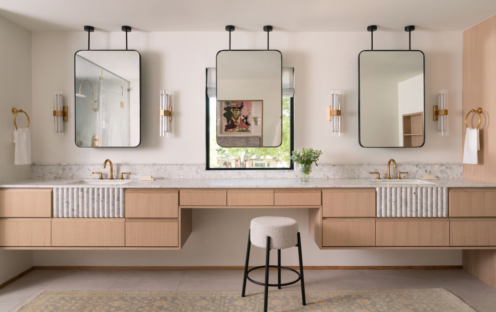 Example of a transitional bathroom design in Austin with flat-panel cabinets, medium tone wood cabinets, a floating vanity and an undermount sink