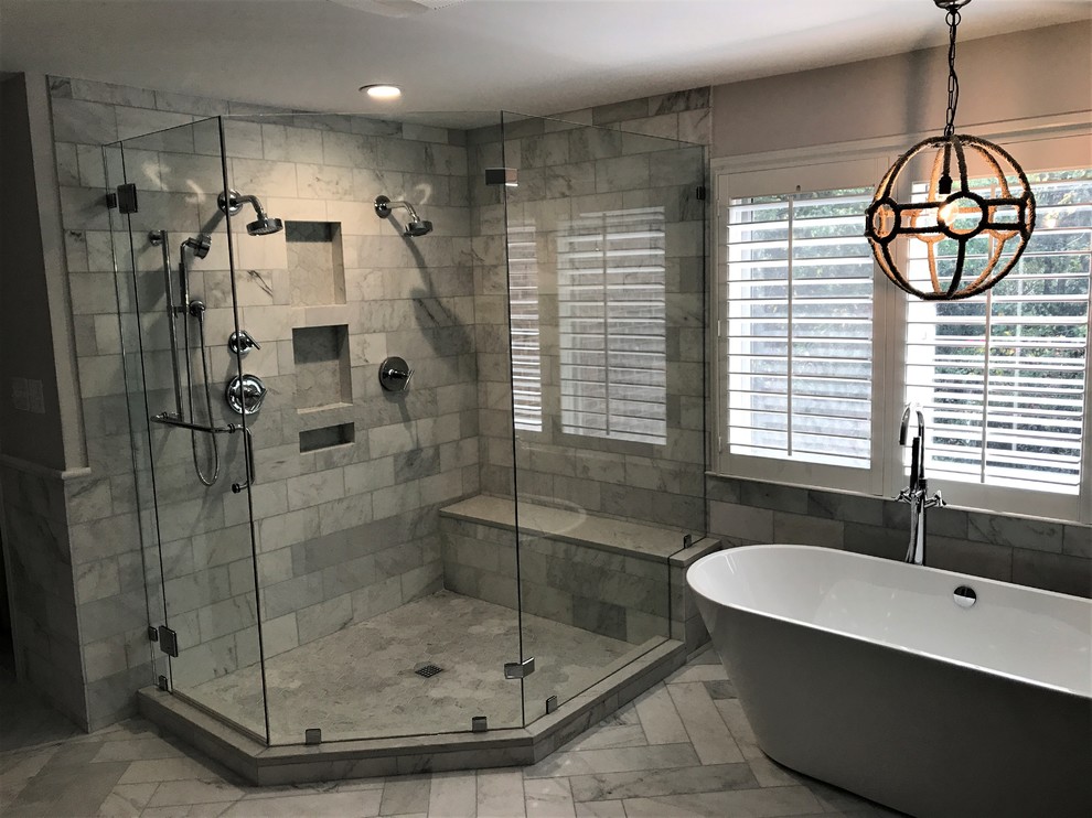 Photo of a large modern master bathroom in DC Metro with a hinged shower door.