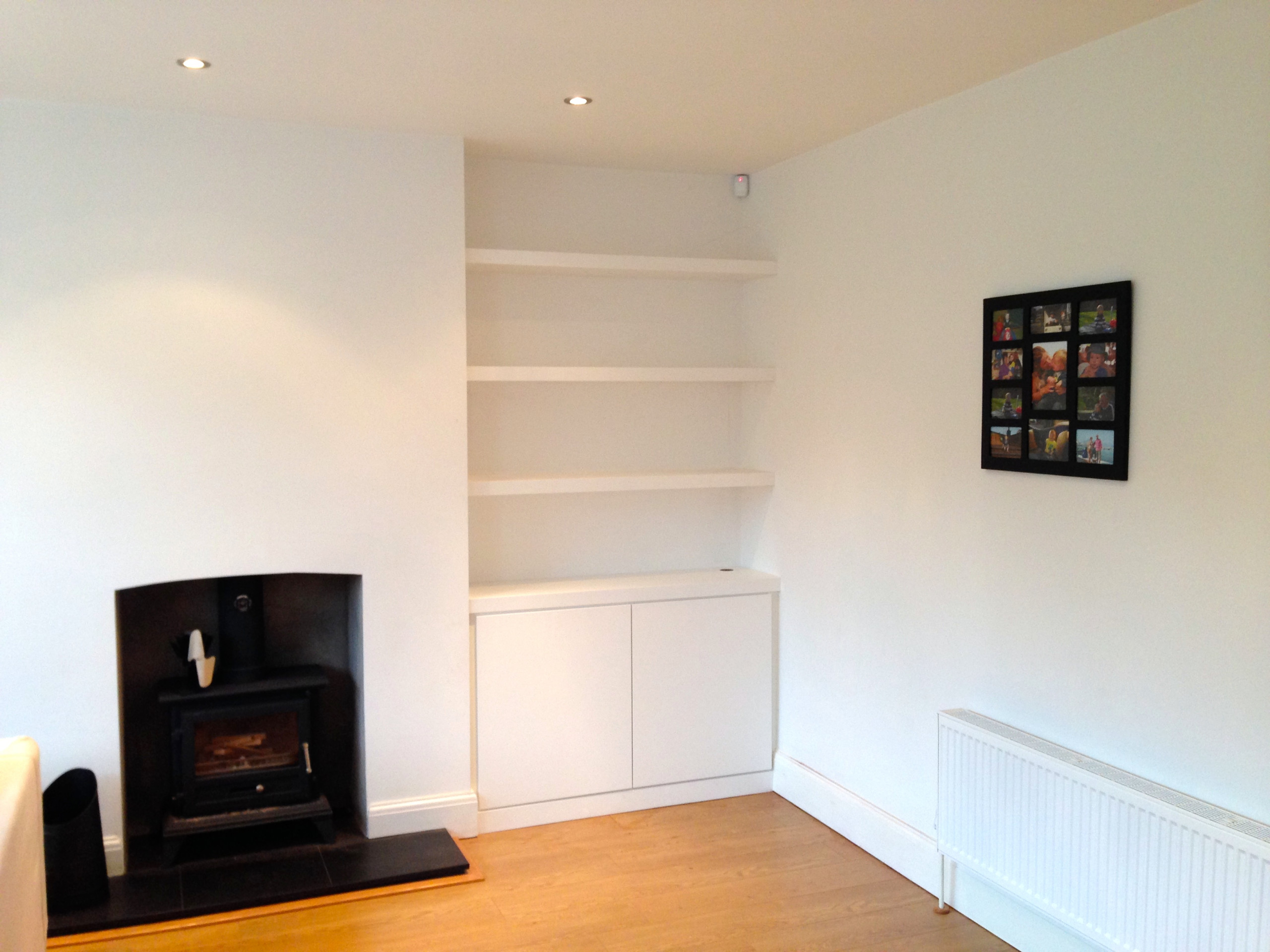 Minimalist White Alcove Cupboard and Floating Shelves