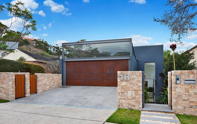 This is an example of a contemporary garage in Sydney.
