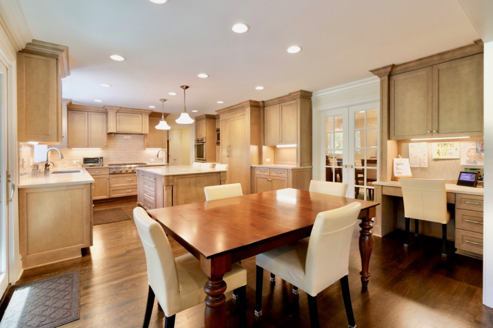 Transitional kitchen photo in Chicago with an island