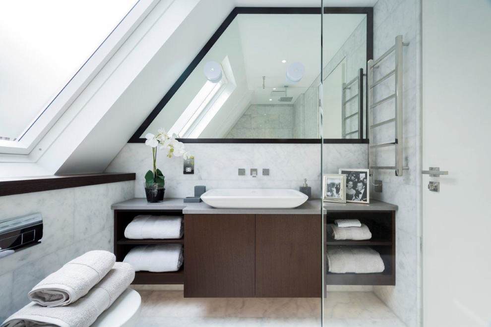 Small contemporary bathroom in Other with flat-panel cabinets, brown cabinets, marble, white walls, marble floors, a vessel sink, concrete benchtops and white floor.