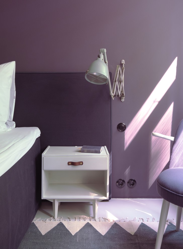 Design ideas for a mid-sized contemporary master bedroom in Berlin with purple walls, linoleum floors, no fireplace and white floor.