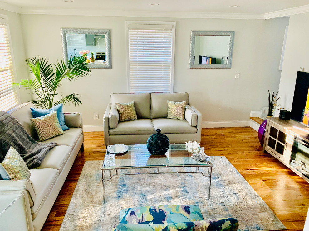 Is my rug too small? Any tips on how I can improve the space.