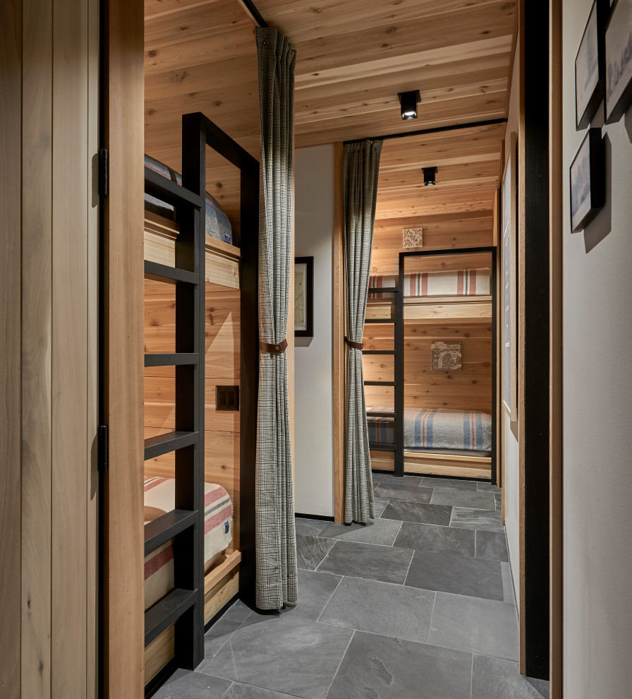 Lawless Retreat - Flannel drapes balance the cedar cladding of these four bunks while also providing for privacy.
