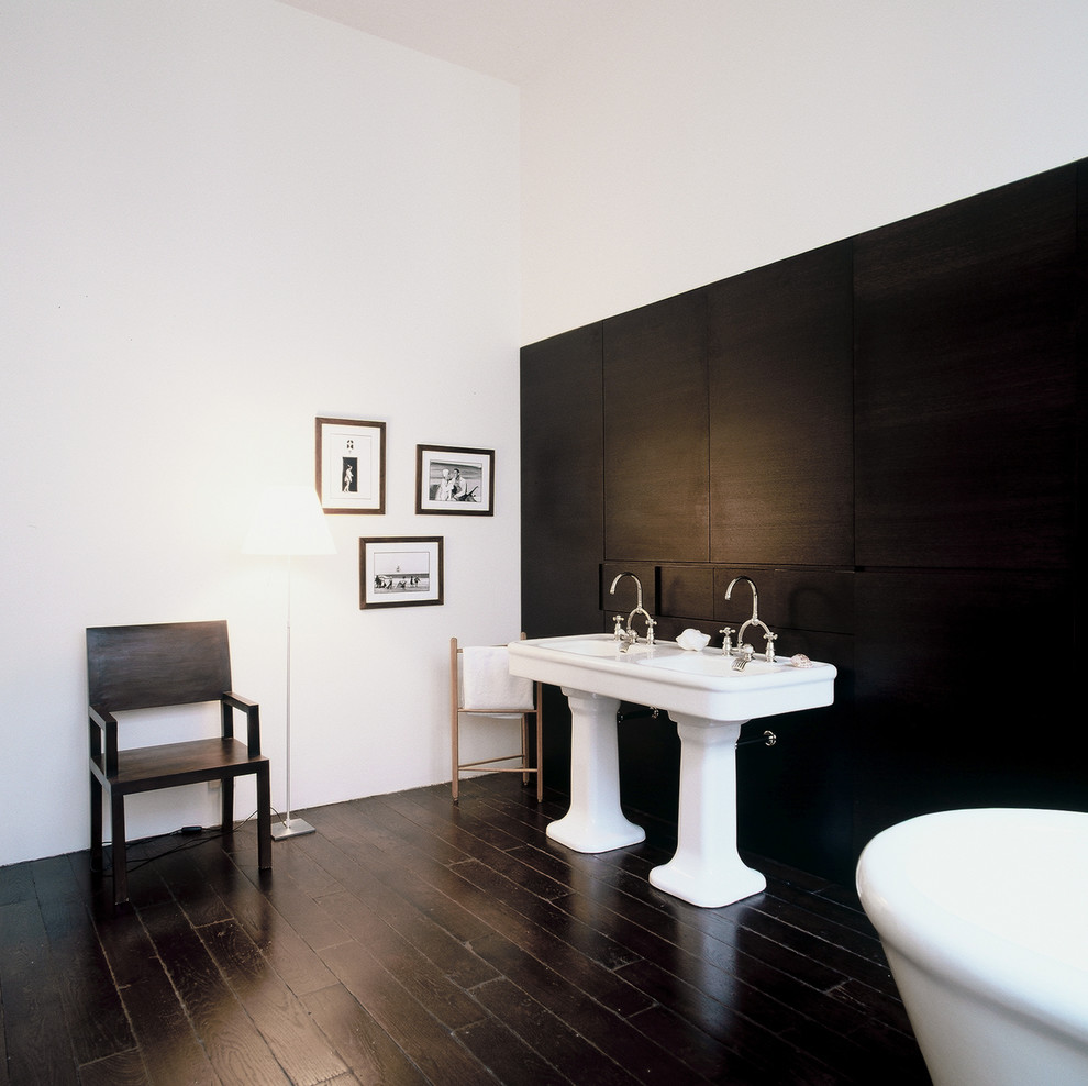 Contemporary master bathroom in Paris with black floor.
