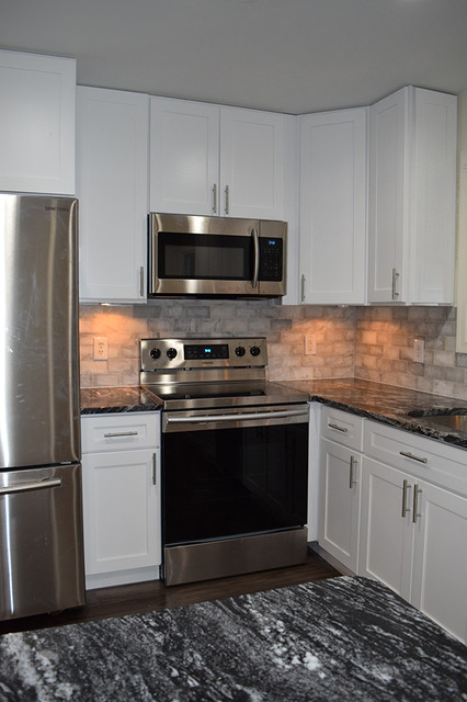 White Shaker Kitchen With New Dark Grey Laminate Flooring