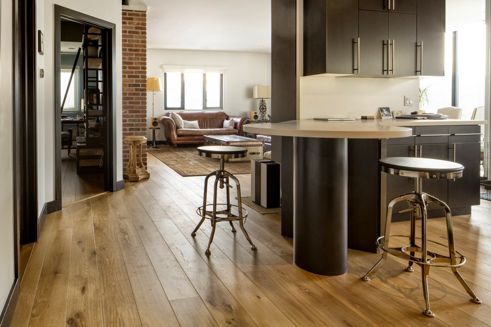 Inspiration for a transitional light wood floor kitchen remodel in Calgary