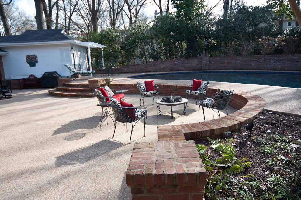 Pool - large backyard kidney-shaped natural pool idea