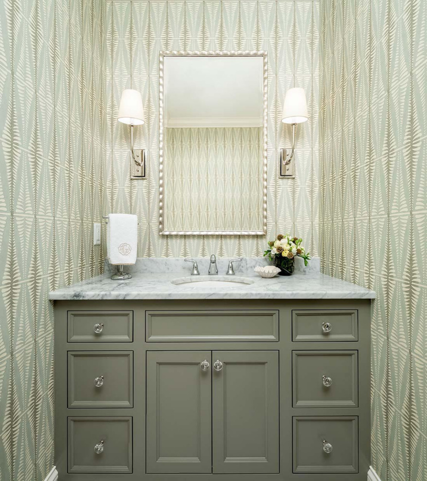 Design ideas for a mid-sized traditional powder room in Minneapolis with a built-in vanity.