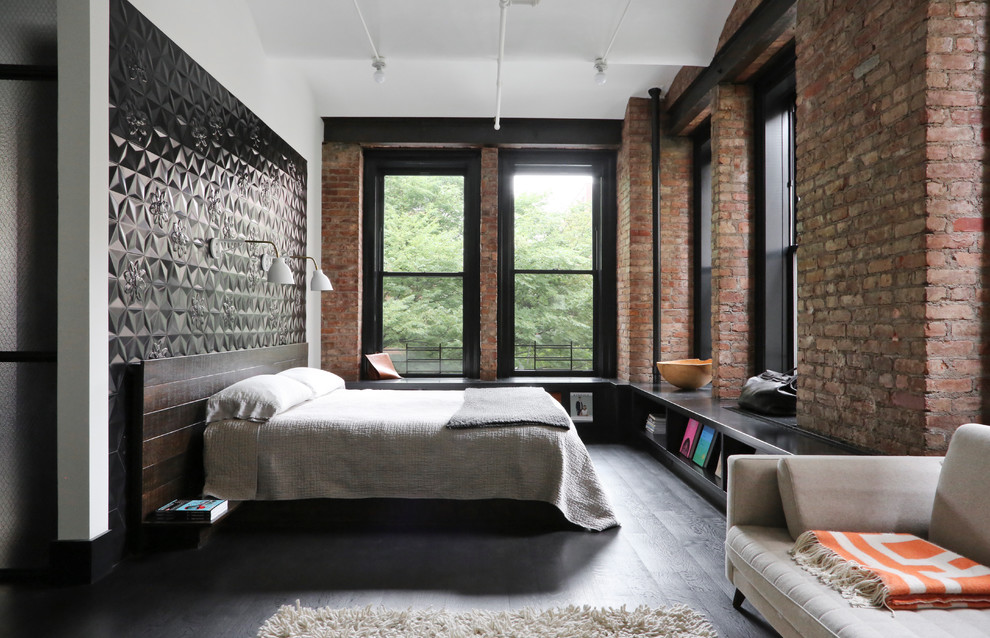 Industrial bedroom in San Francisco with white walls, dark hardwood floors and black floor.