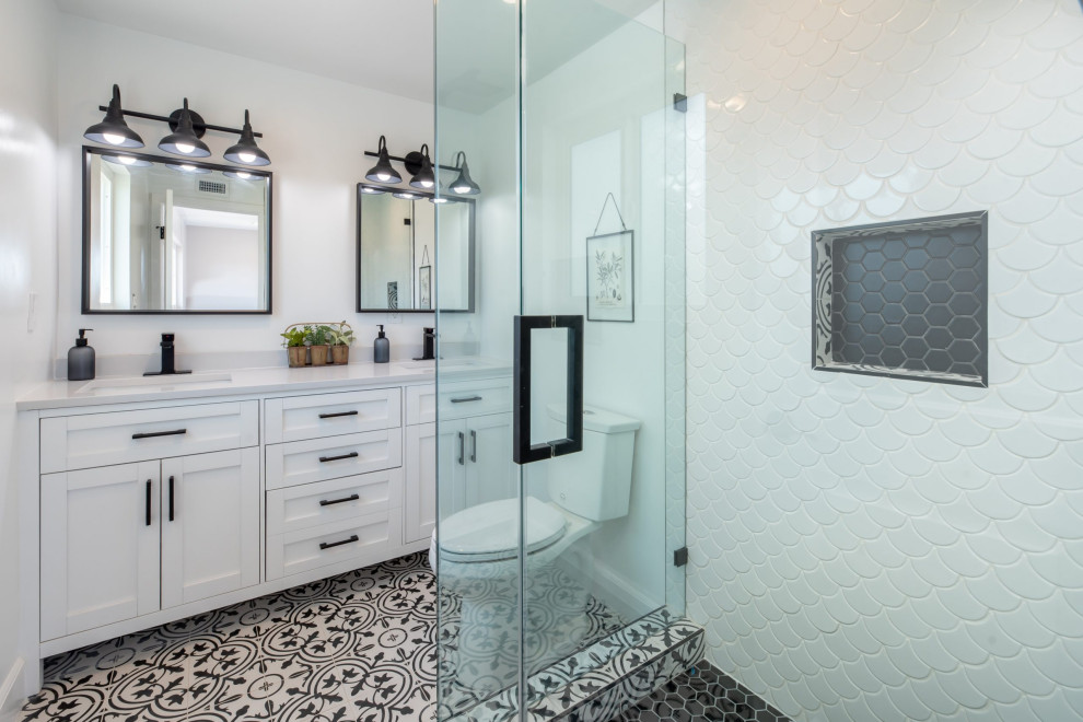 Design ideas for a large midcentury 3/4 wet room bathroom in San Diego with shaker cabinets, white cabinets, a two-piece toilet, white tile, ceramic tile, white walls, mosaic tile floors, an undermount sink, a hinged shower door, a double vanity and a built-in vanity.