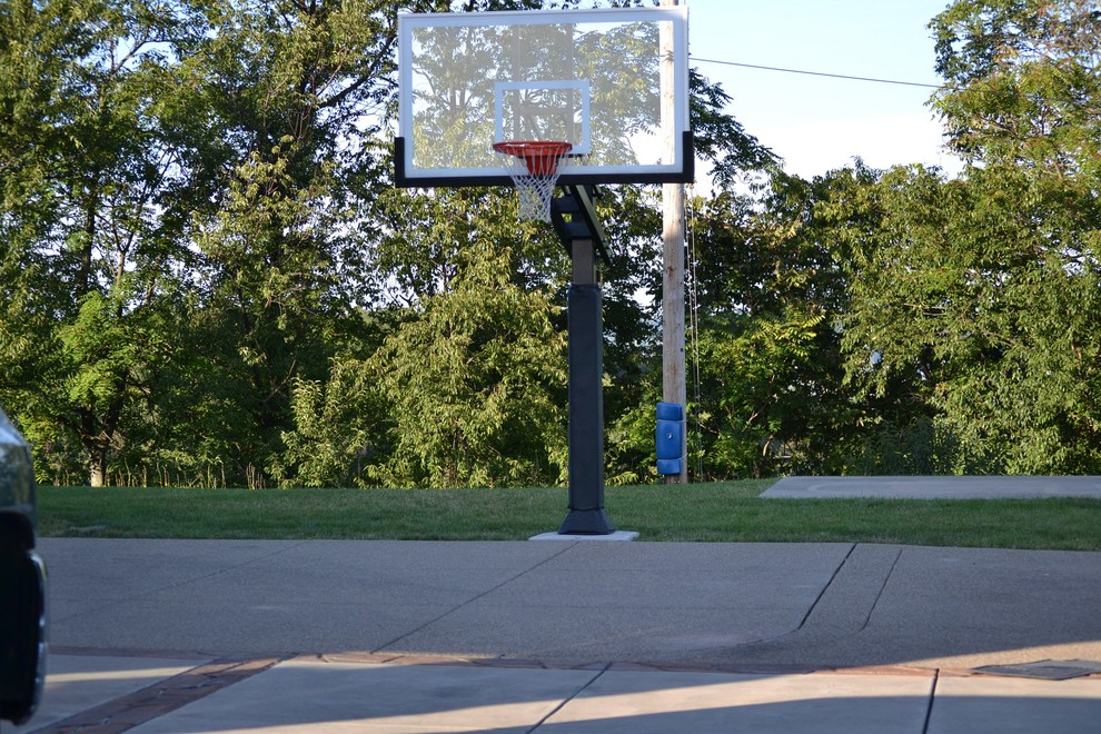 This is an example of a large traditional front yard partial sun outdoor sport court in Cleveland.