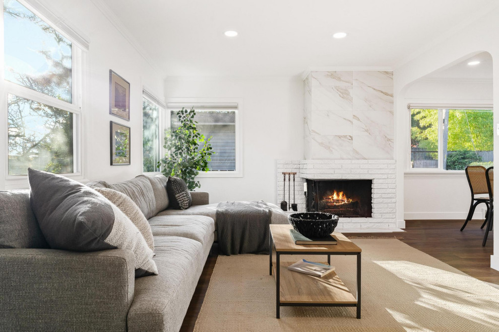 Living room - transitional dark wood floor and brown floor living room idea in Seattle