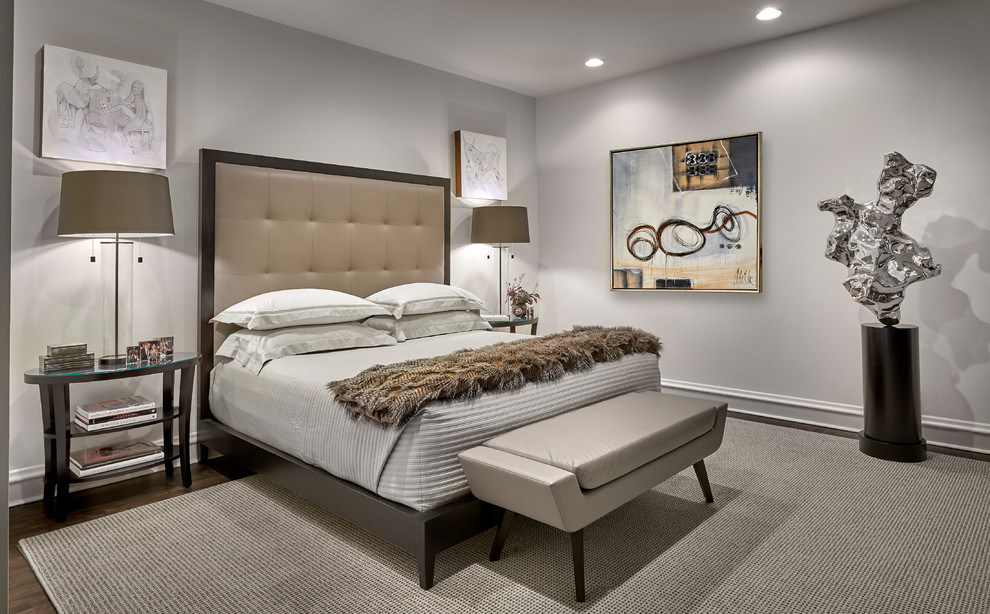 Photo of a large contemporary master bedroom in Chicago with grey walls, dark hardwood floors, no fireplace and brown floor.