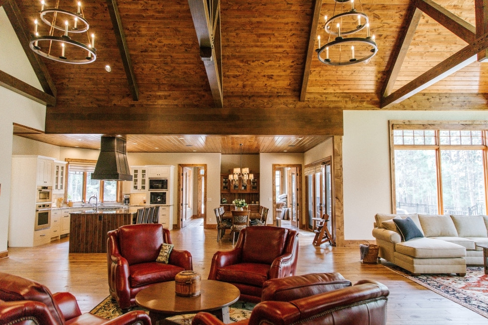Example of a mountain style home design design in Denver