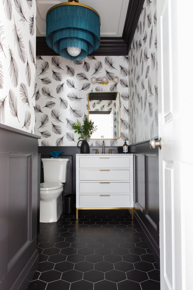 This is an example of a traditional cloakroom in New York with white cabinets, black and white tiles, black walls, porcelain flooring, engineered stone worktops, black floors, white worktops, a freestanding vanity unit, a coffered ceiling, wallpapered walls and a dado rail.