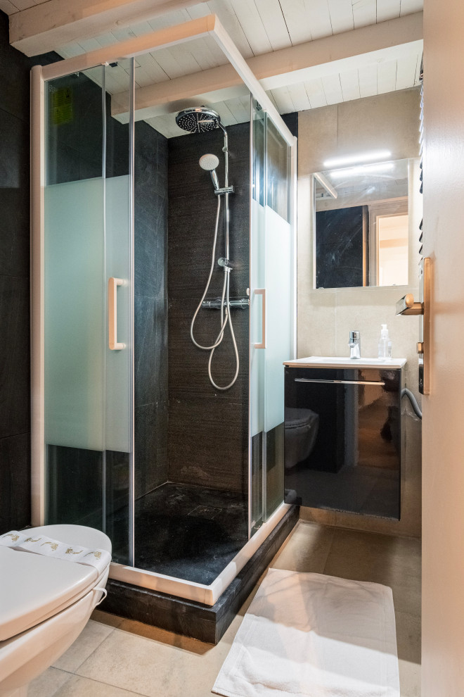 This is an example of a small modern bathroom in Other with glass-front cabinets, black cabinets, a corner shower, cement tile, beige walls, tile benchtops, beige floor, an enclosed toilet, a single vanity, a floating vanity, wood and ceramic floors.