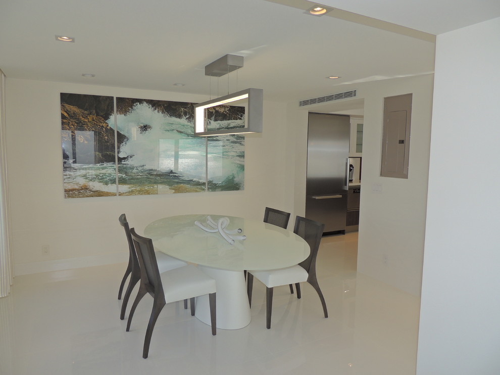 Mid-sized contemporary kitchen/dining combo in Miami with white walls, porcelain floors and no fireplace.