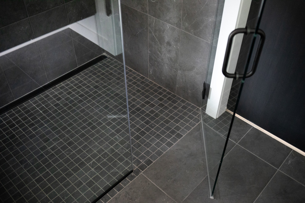 Modern bathroom in Other with a built-in shower, porcelain flooring, grey floors and a hinged door.