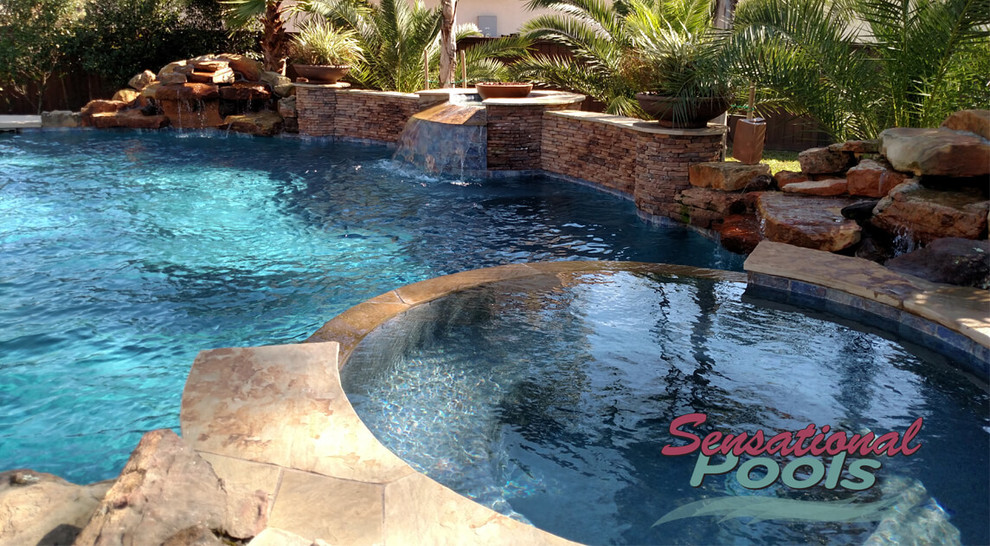 Inspiration for a large mediterranean backyard concrete and custom-shaped natural pool fountain remodel