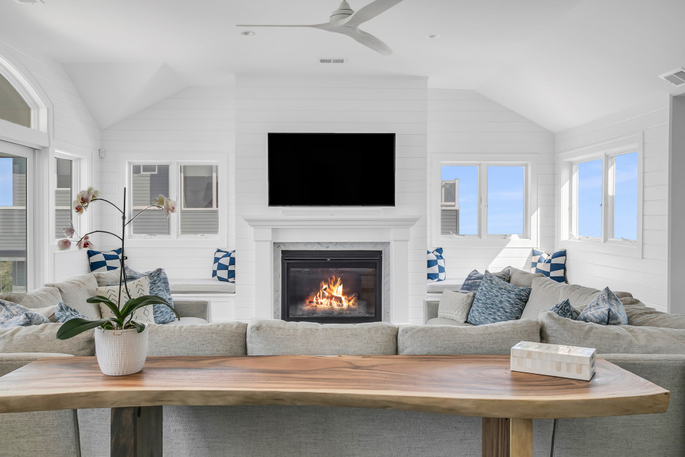 Photo of a large beach style living room in Austin.