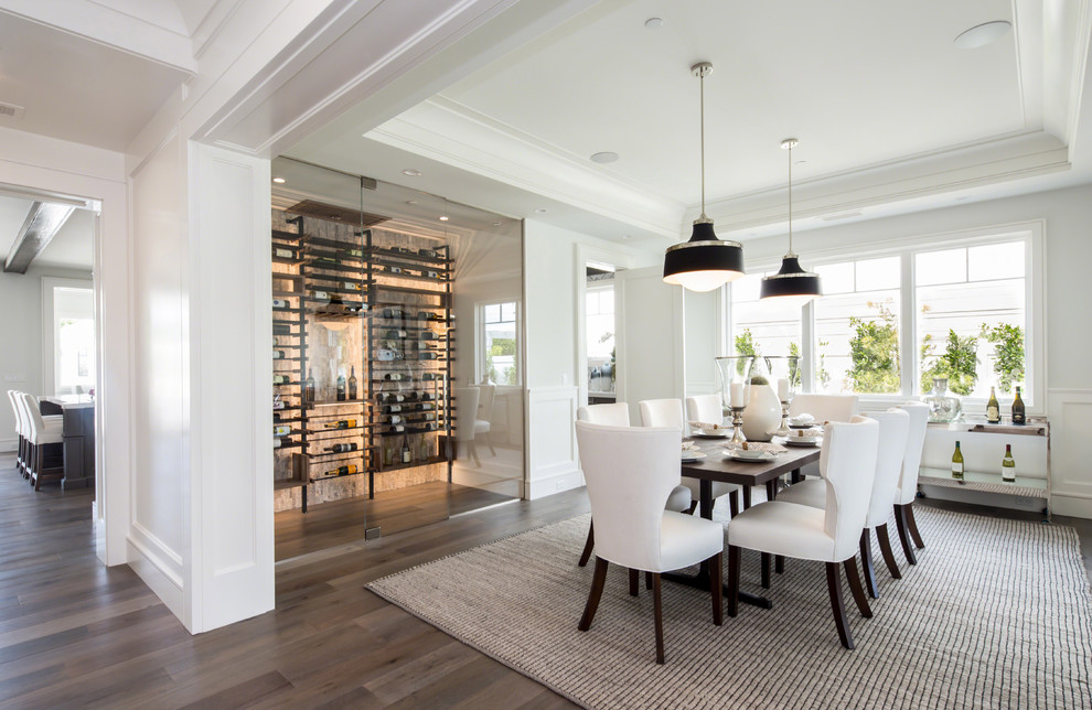Mid-sized traditional open plan dining in Los Angeles with white walls, medium hardwood floors and brown floor.