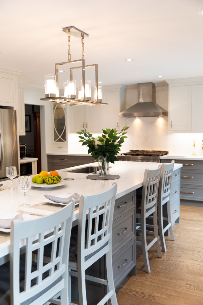 Example of a transitional kitchen design in Toronto