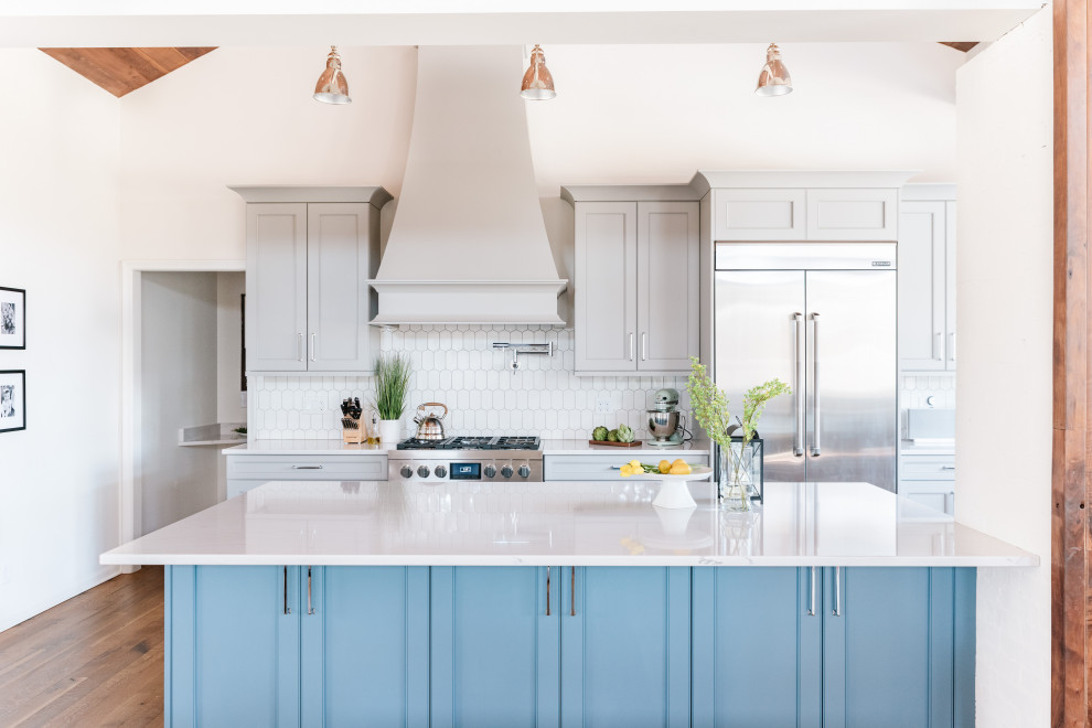 Large transitional kitchen photo in Omaha with an island