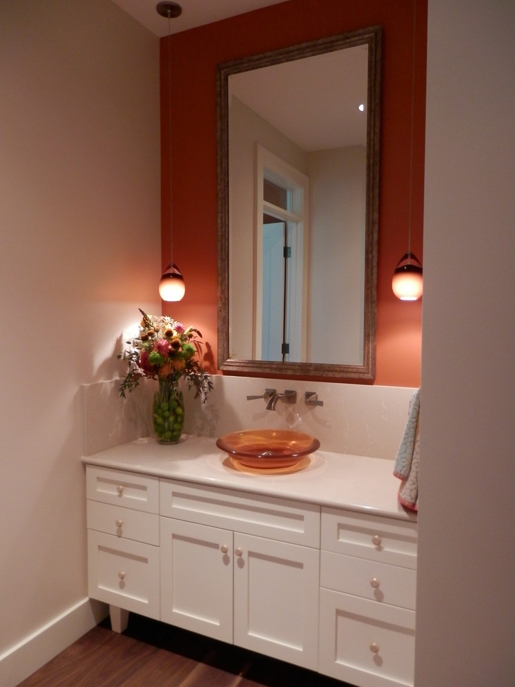 Inspiration for a large traditional 3/4 bathroom in Seattle with a vessel sink, shaker cabinets, white cabinets, engineered quartz benchtops, a curbless shower, orange walls, medium hardwood floors and a two-piece toilet.