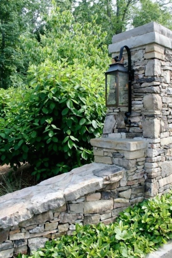 Design ideas for a mid-sized rustic partial sun backyard stone formal garden in Birmingham for summer.