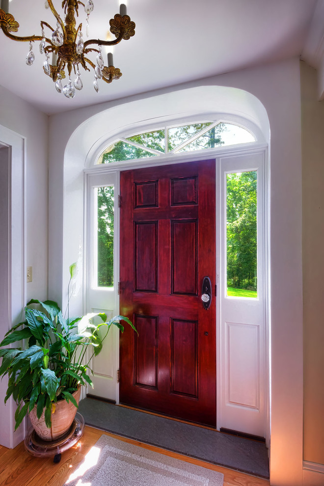 Front door - mid-sized rustic medium tone wood floor front door idea in New York with white walls and a medium wood front door