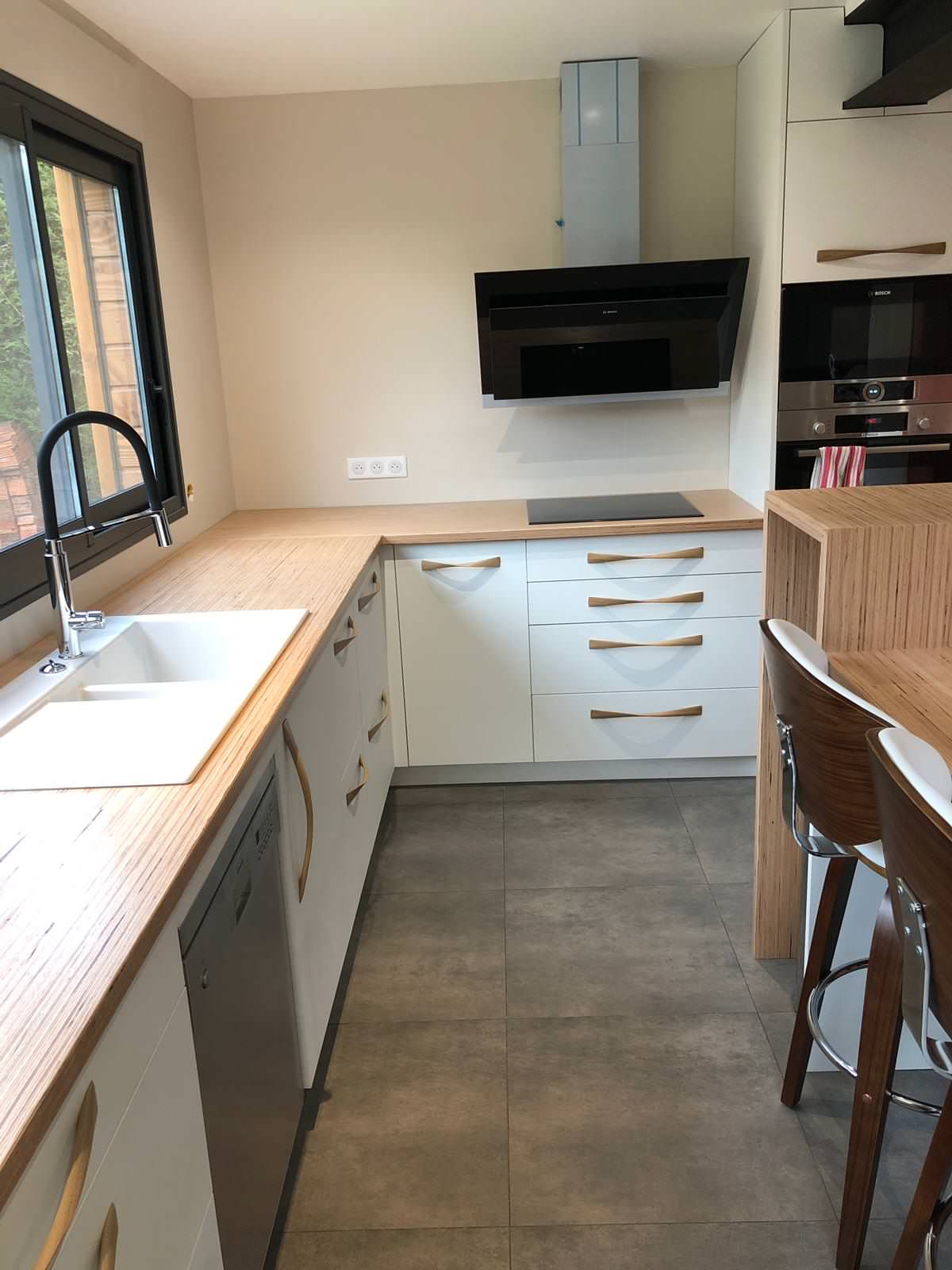 Extension en ossature bois d'une maison individuelle