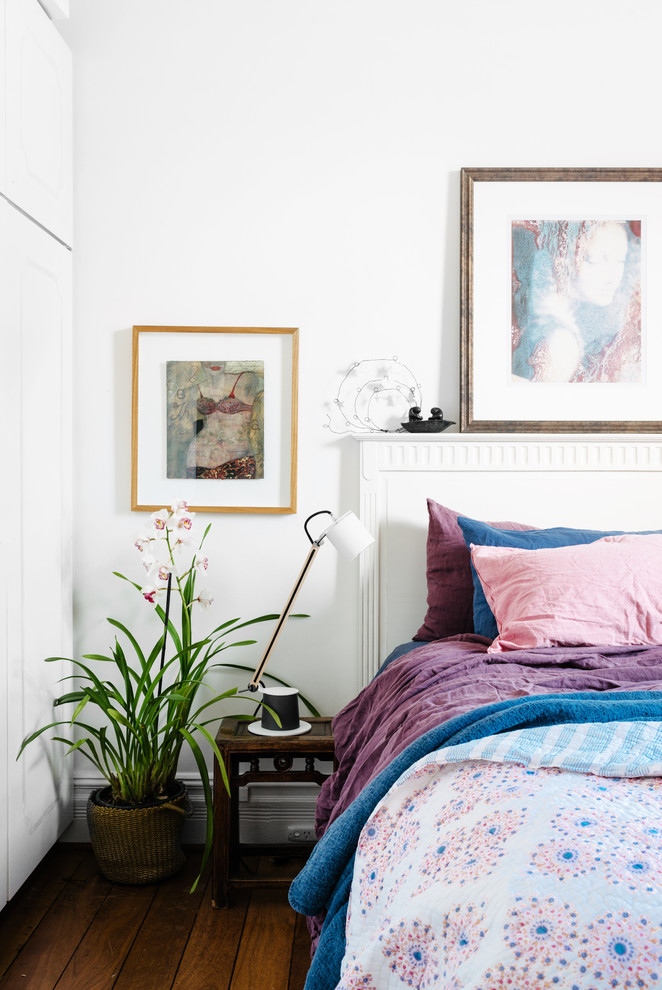 Design ideas for an eclectic master bedroom in Perth with white walls.