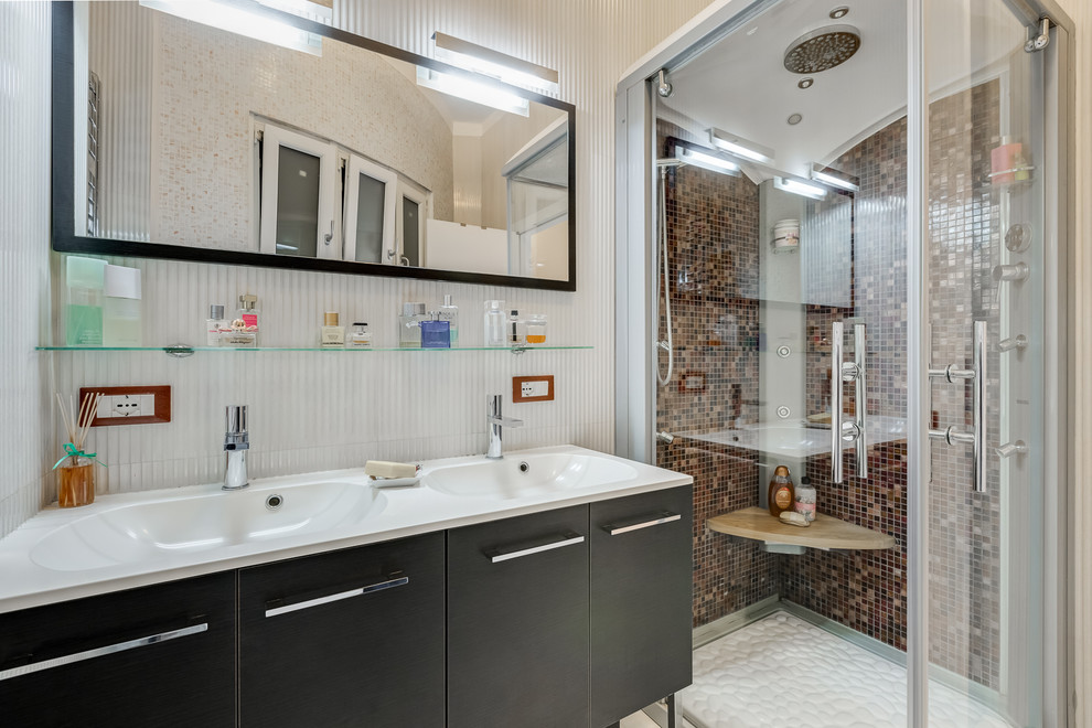 Design ideas for a small modern bathroom in Rome with flat-panel cabinets, brown cabinets, a corner shower, multi-coloured tile, porcelain tile, beige walls, porcelain floors, with a sauna, a drop-in sink, beige floor and a hinged shower door.