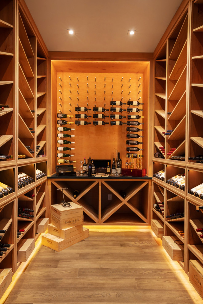 Design ideas for a transitional wine cellar in Austin.
