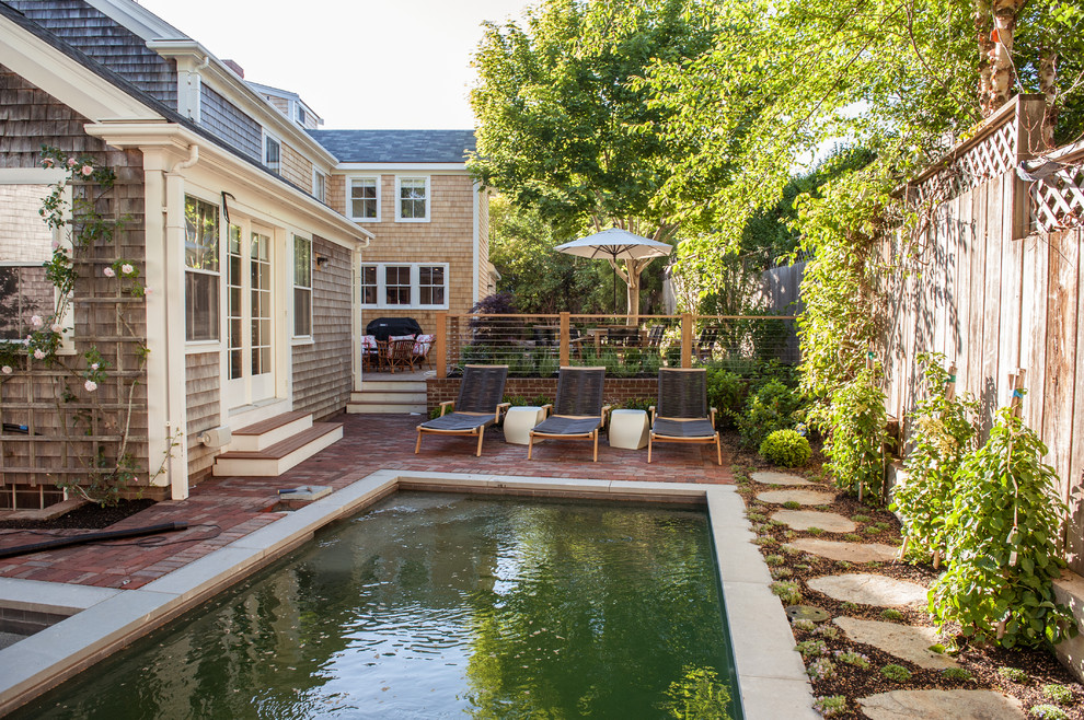 Example of a transitional exterior home design in Boston