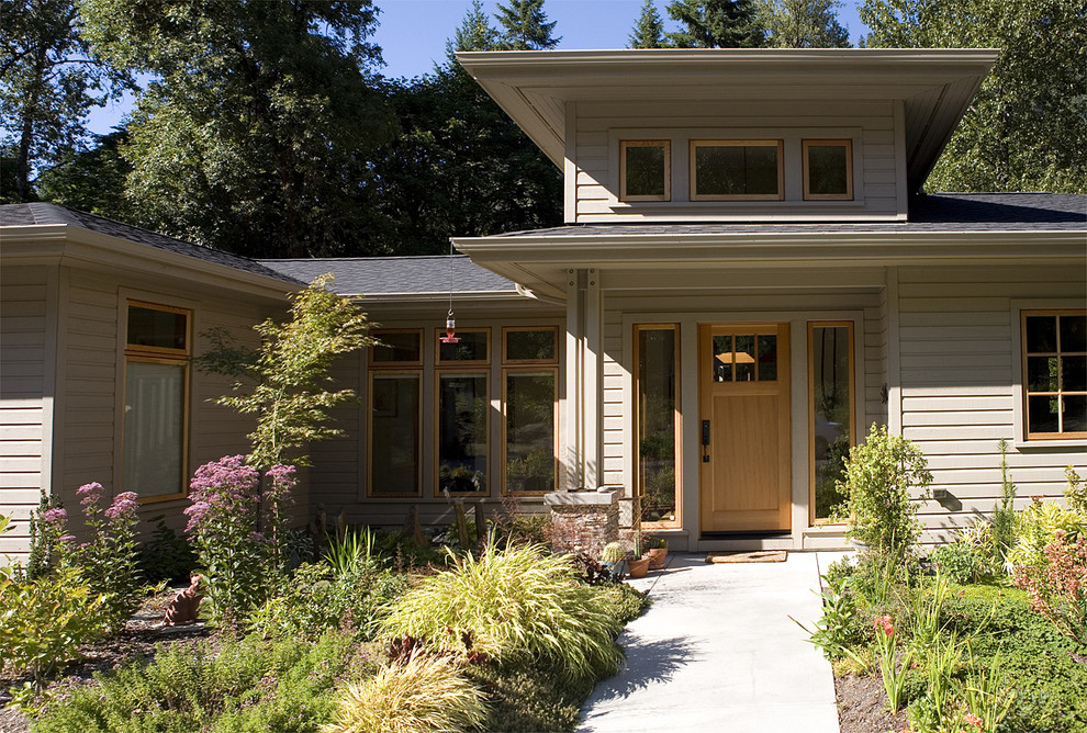 Inspiration for an arts and crafts exterior in Seattle with wood siding.