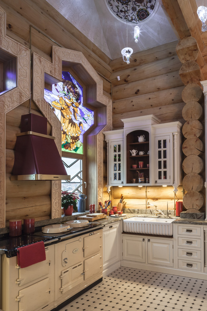 Photo of a mid-sized eclectic l-shaped kitchen in Moscow with raised-panel cabinets, white cabinets, coloured appliances, ceramic floors, no island and a farmhouse sink.
