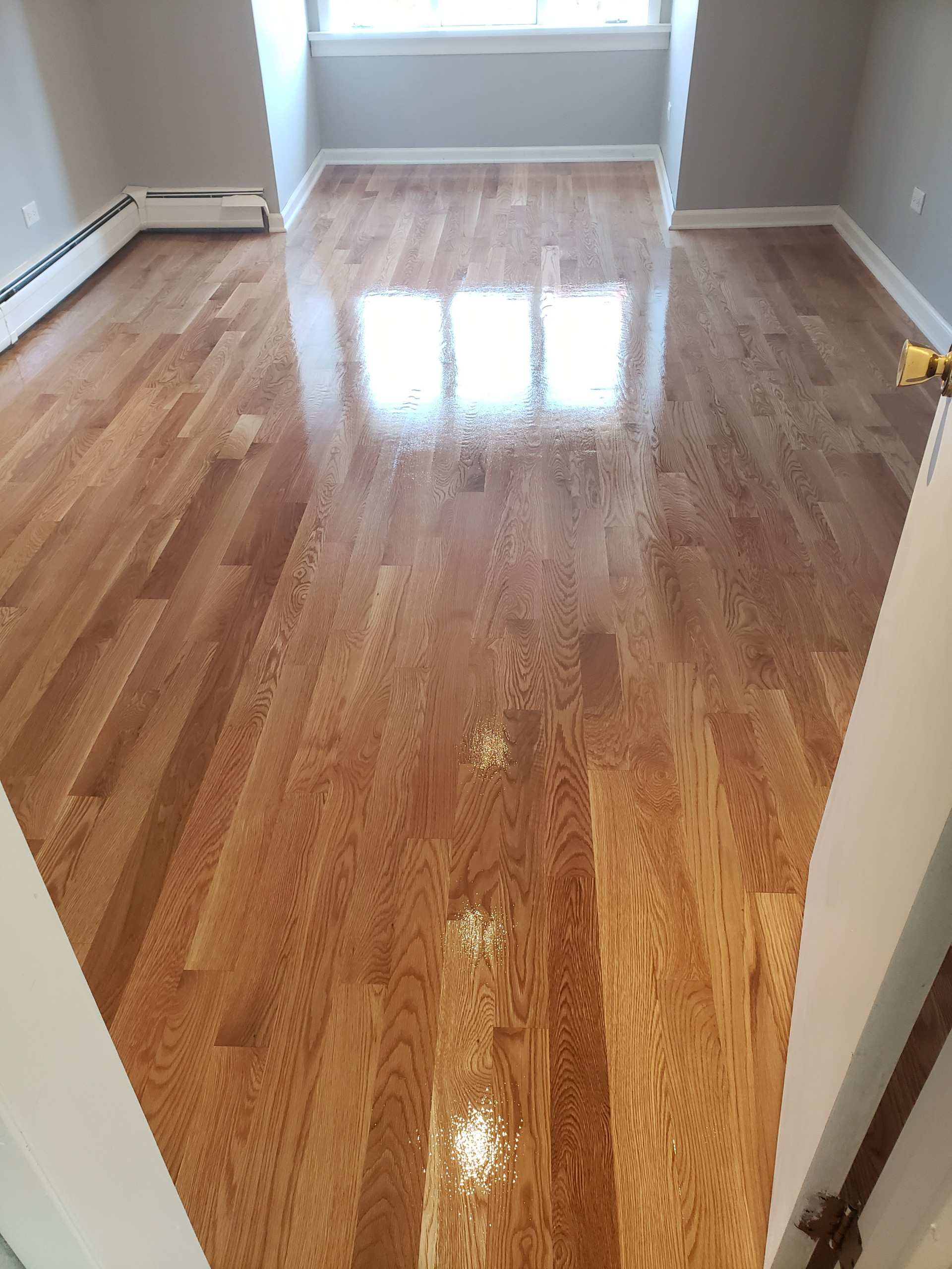 Oak Park , 3 and 1/4 white oak new install , natural , 3 coats Bona Mega One