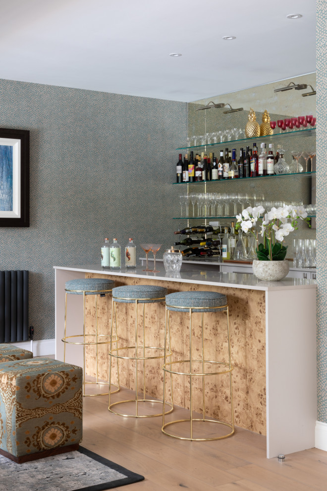 Design ideas for a transitional home bar in London.