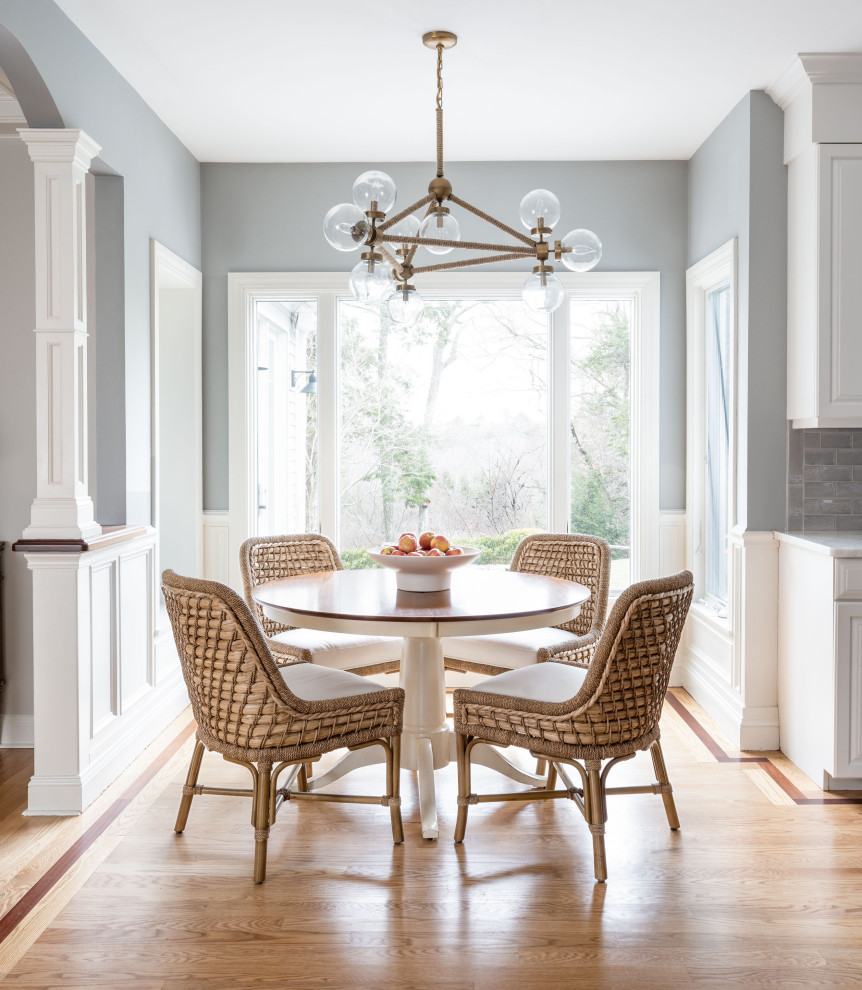 This is an example of a beach style dining room in Boston.