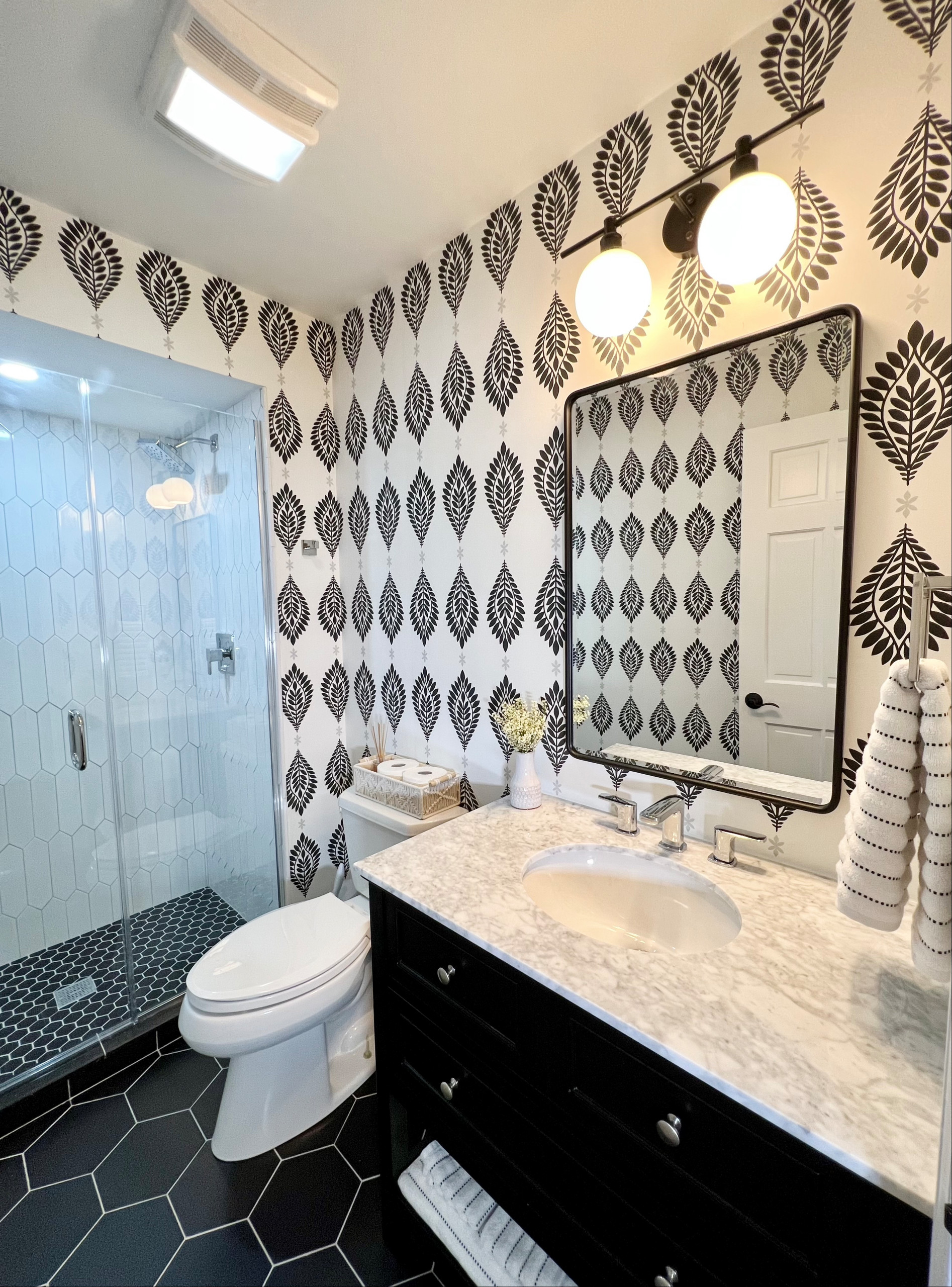 Two Traditionally Designed Bathrooms