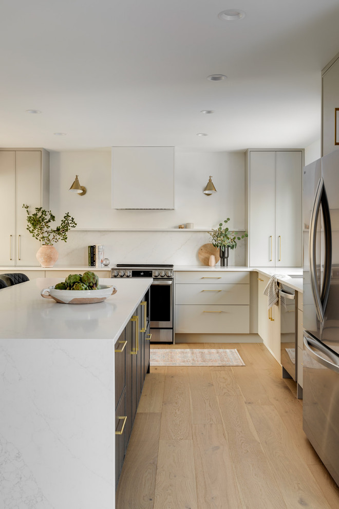 Example of a transitional kitchen design in Calgary