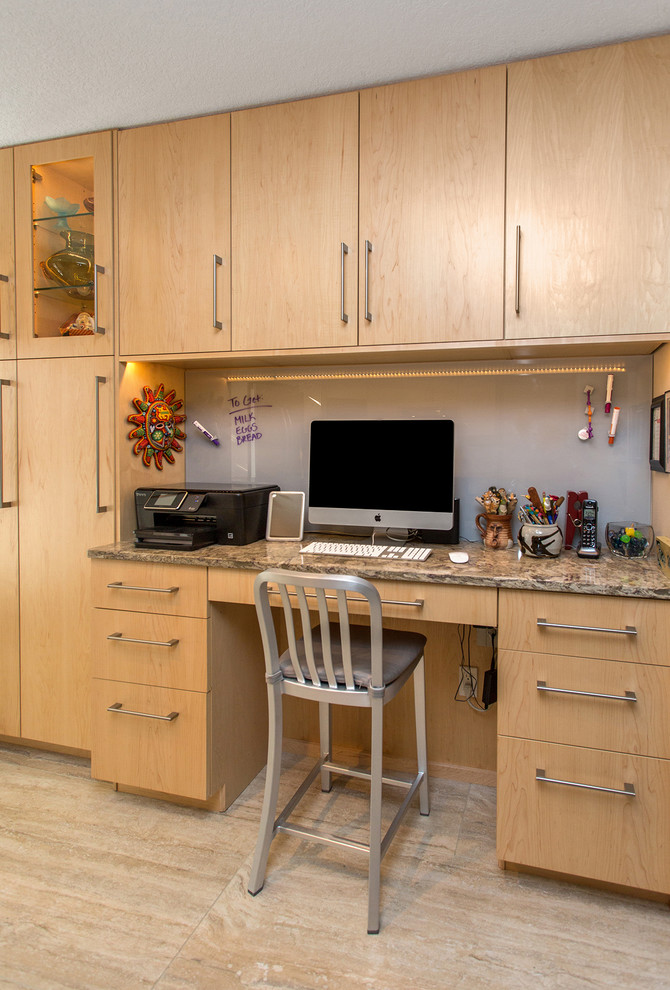 Inspiration for a mid-sized transitional l-shaped porcelain tile open concept kitchen remodel with an undermount sink, flat-panel cabinets, light wood cabinets, beige backsplash, stainless steel appliances, an island, quartz countertops and porcelain backsplash
