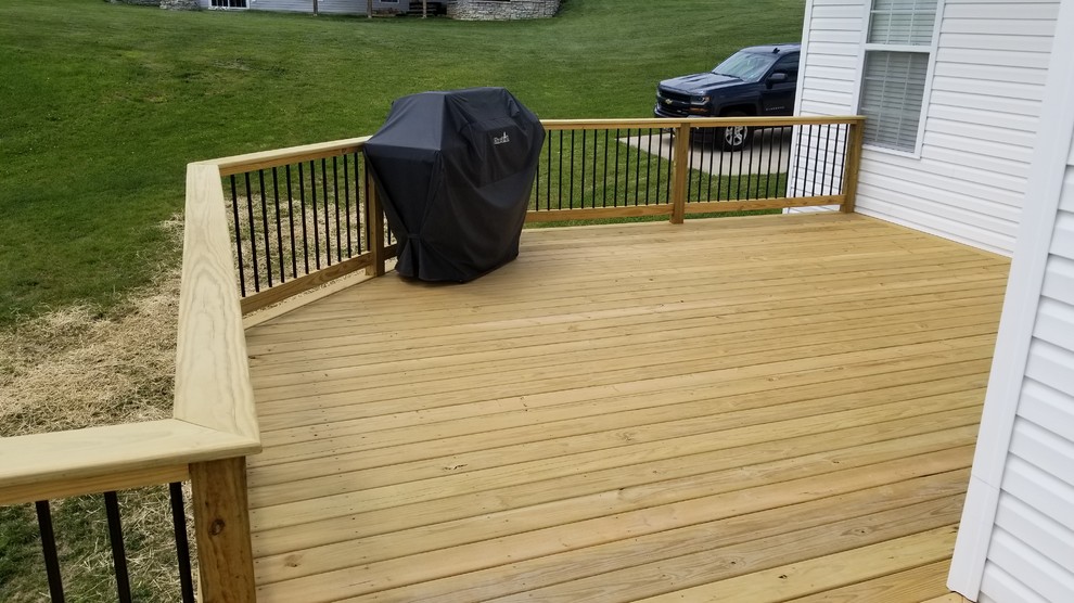 Inspiration for a large craftsman deck remodel