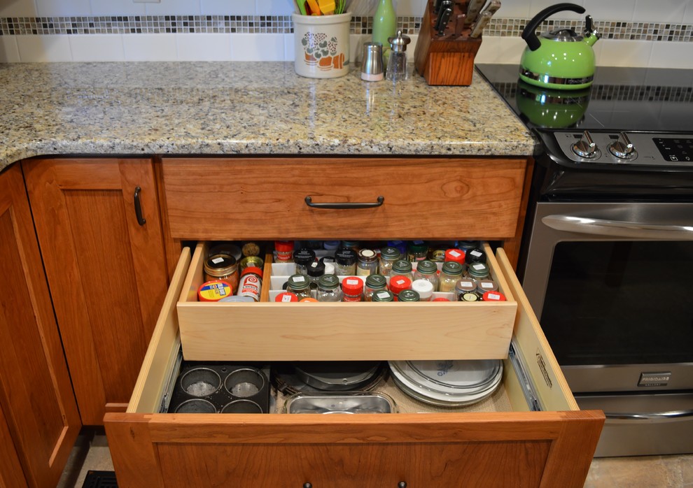 Inspiration for a mid-sized u-shaped kitchen remodel with granite countertops