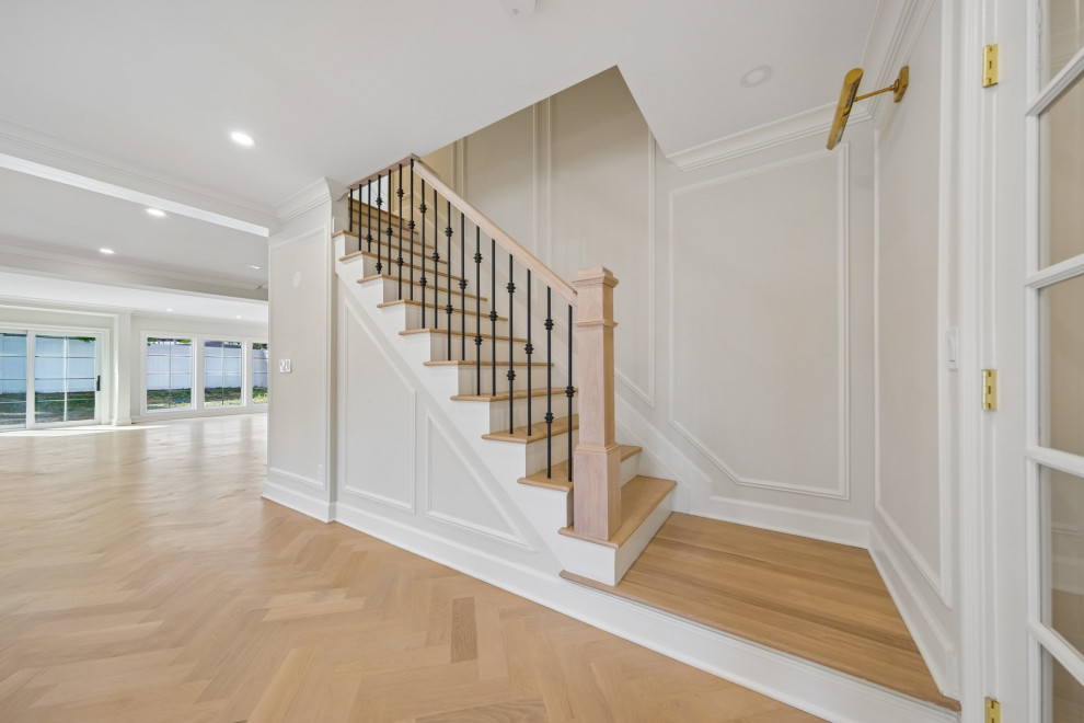 Staircase with Iron Balusters & Wainscoting in Teaneck, NJ