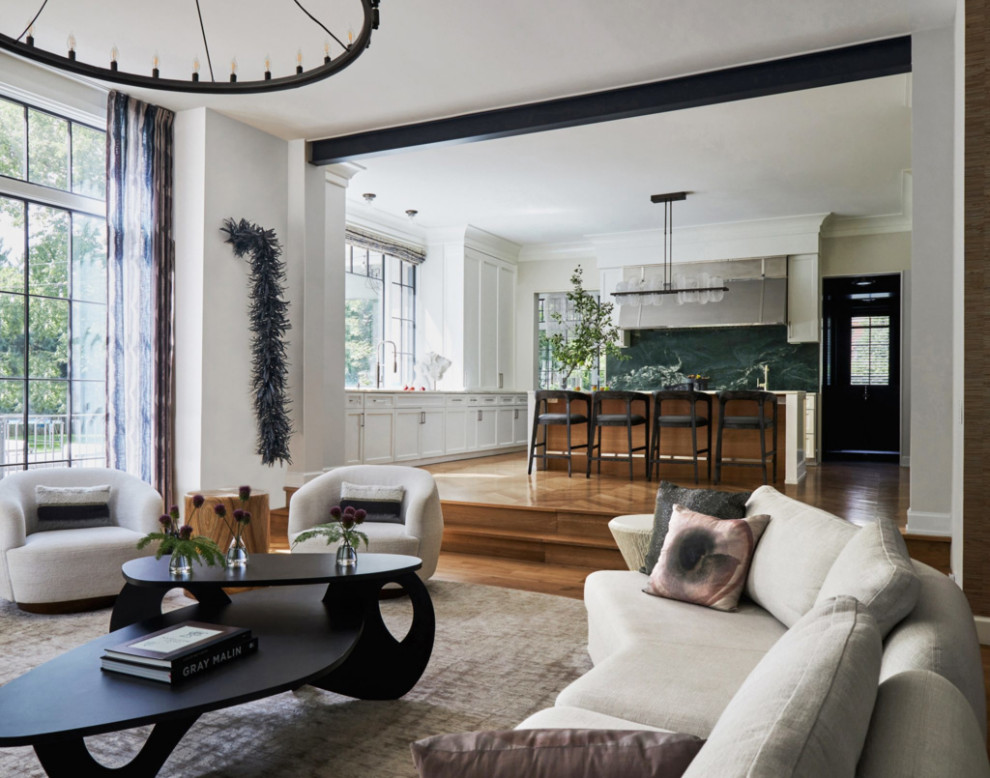 This is an example of a medium sized contemporary formal open plan living room in New York with white walls, light hardwood flooring, a standard fireplace, a stacked stone fireplace surround, a wall mounted tv, brown floors, a timber clad ceiling and panelled walls.