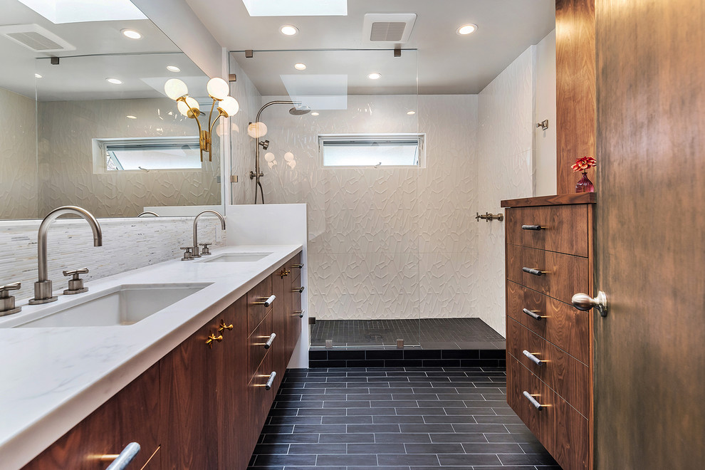 Transitional bathroom in San Francisco with flat-panel cabinets, medium wood cabinets, an alcove shower, white tile, grey walls, an undermount sink, black floor, an open shower and white benchtops.